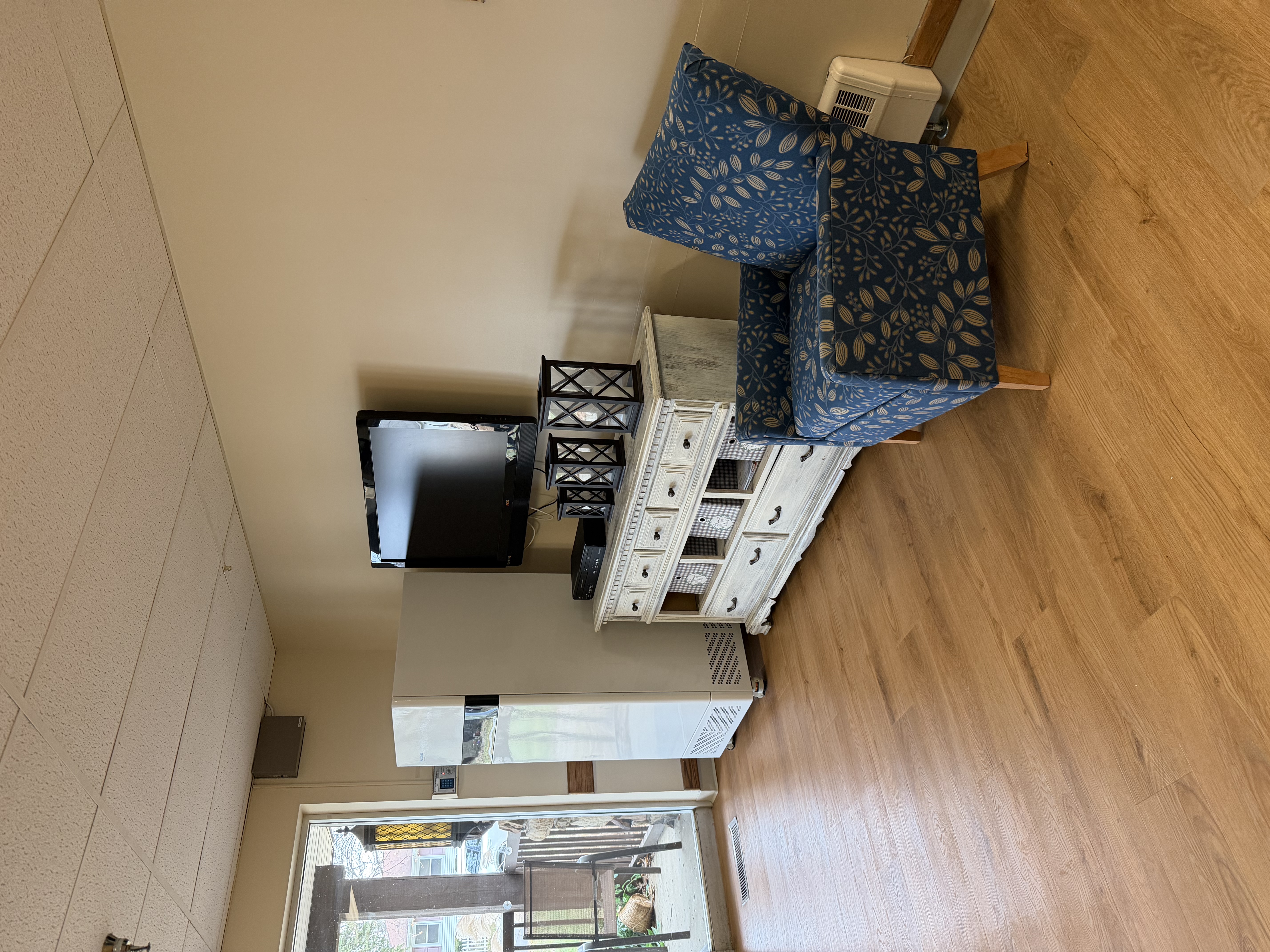 Lounge area with Television and chair