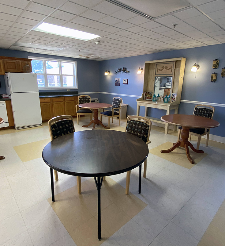 Brickyard Healthcare Elkhart Care Center kitchen area with tables and chairs