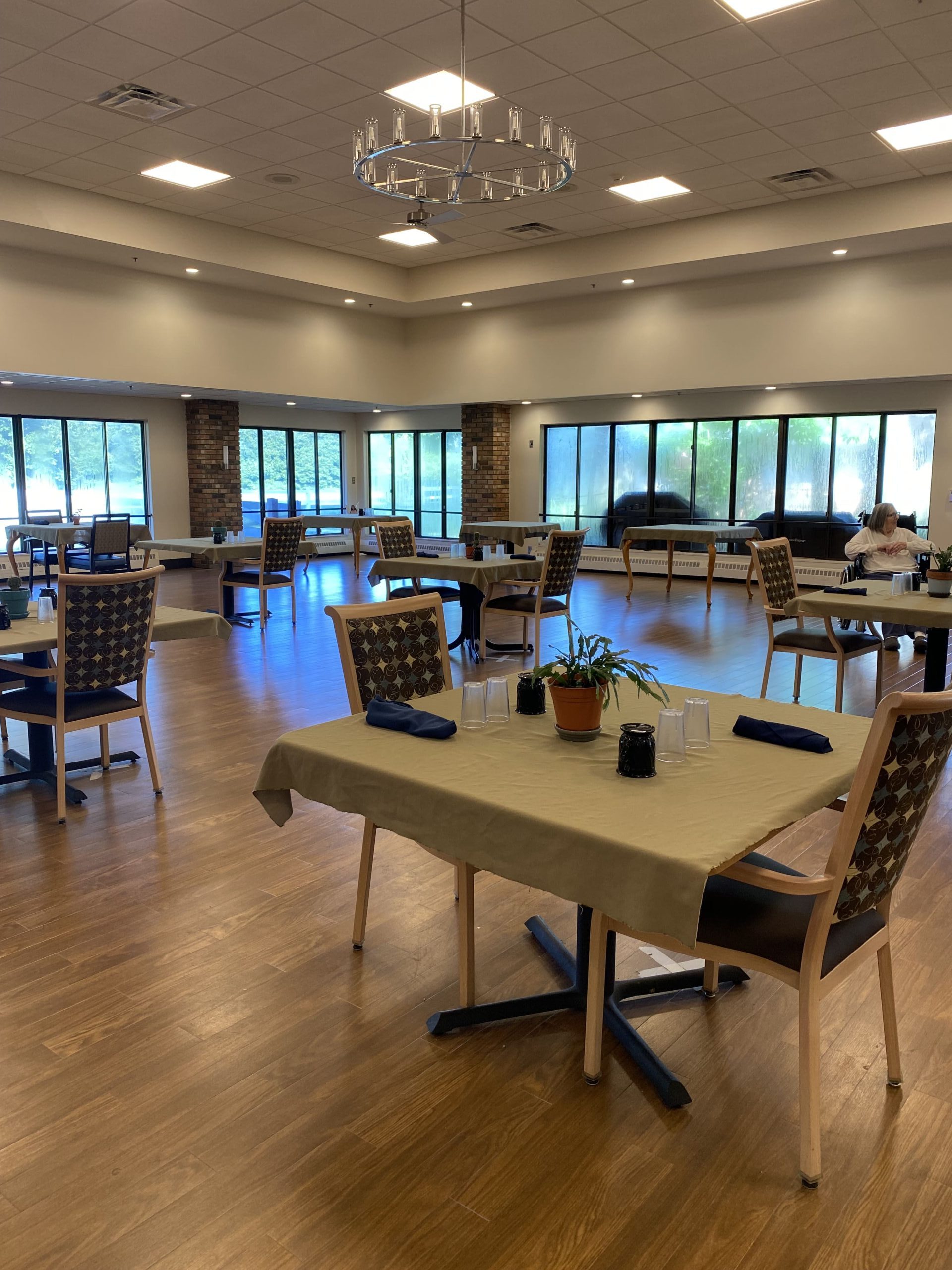 Brickyard Healthcare Fountainview Care Center dining area with tables and chairs