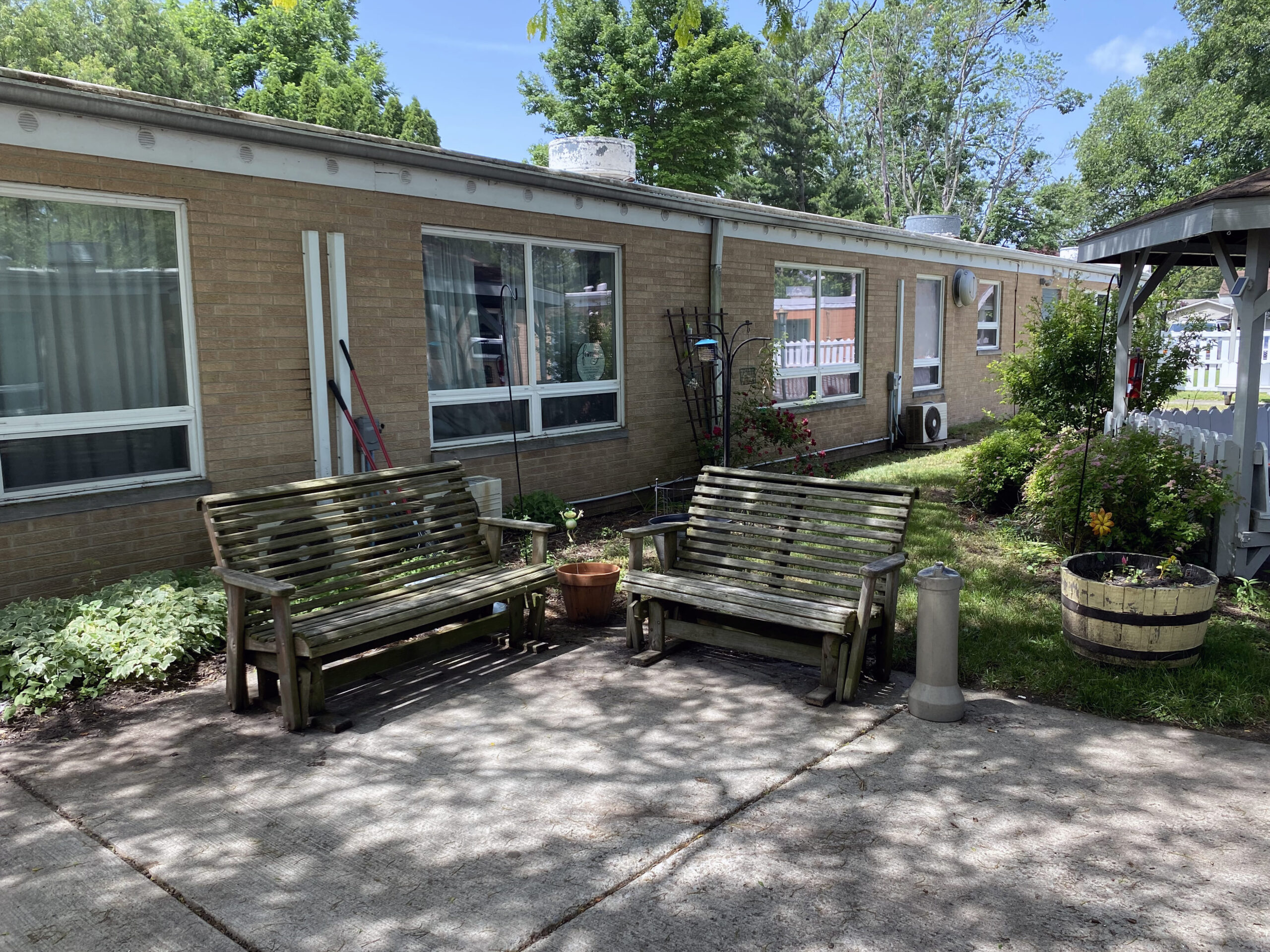 Brickyard Healthcare LaPorte Care Center exterior patio area with benches