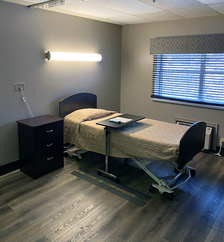 Brickyard Healthcare Sycamore Village Care Center resident bedroom suite