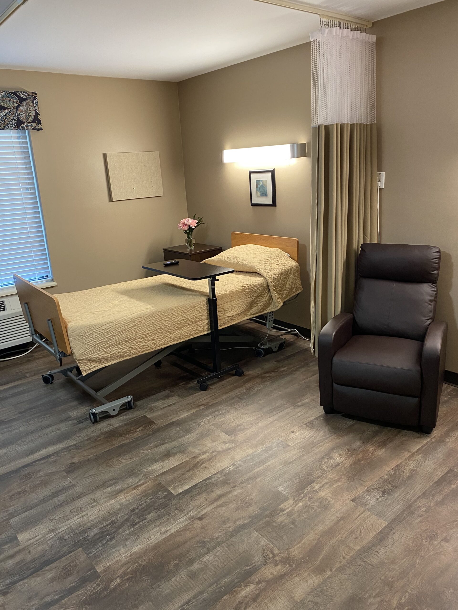 Brickyard Healthcare Woodlands Care Center resident bedroom suite